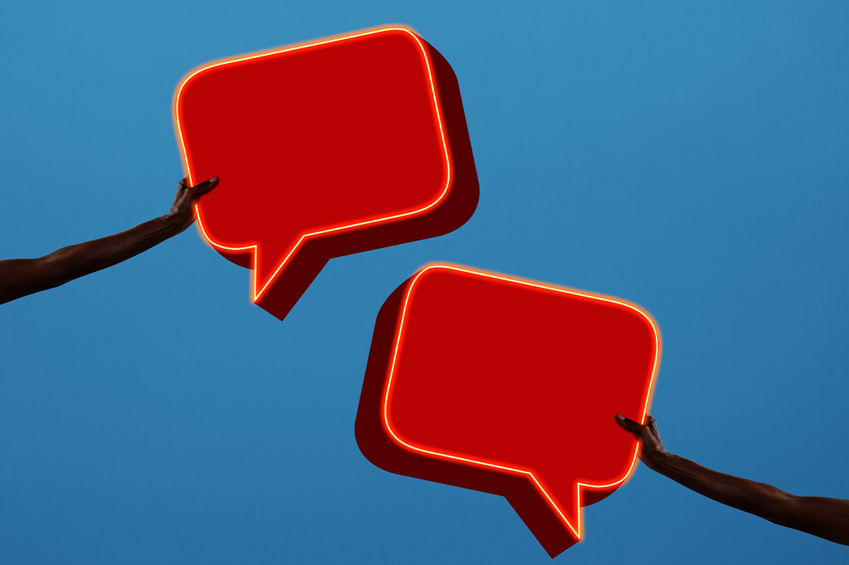arms holding large speech bubbles